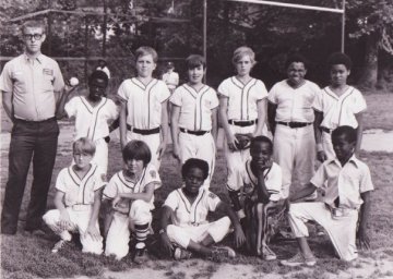 We played Little League in Harlan County.  Your author is on the front row, far left end.